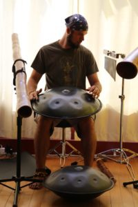 Jeremy Arndt performing his own compilations during a solstice yoga class at Just B Yoga in 2013.