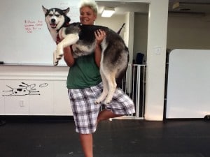 Maya was lifted into her owner's tree pose. She stayed very relaxed.