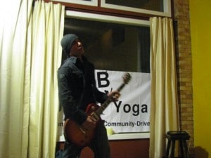 A guitarist performs during an open mic evening at Just B Yoga. (Back in the day!)
