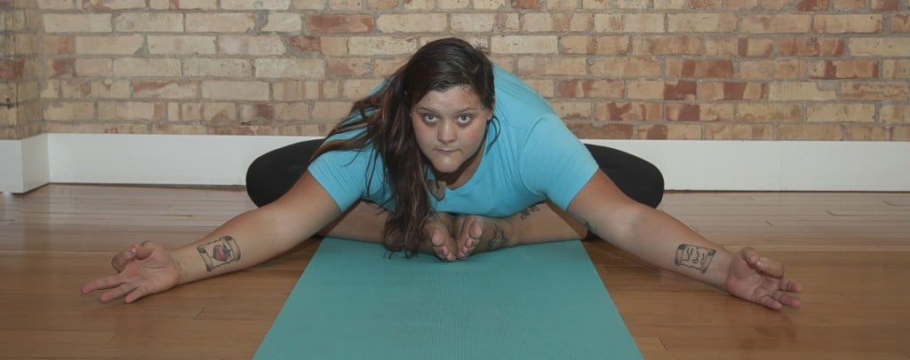 Connie Bonnie in baddha konasana yoga pose.