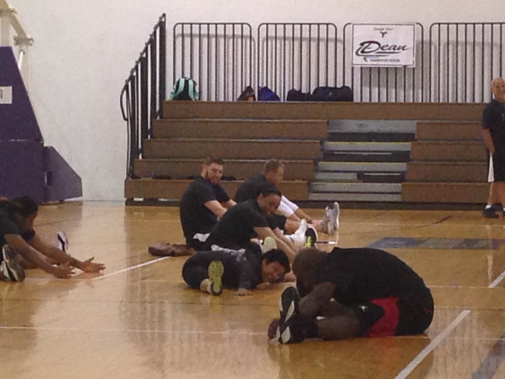 Mateen Cleaves doing yoga with Belinda from Just B Yoga at his 1 Goal 1 Passion Basketball Camp in Lansing.