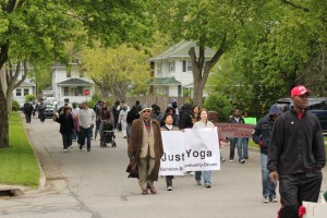 Just B Yoga participating in a march for peace after a surge in gun violence in Lansing in 2012.